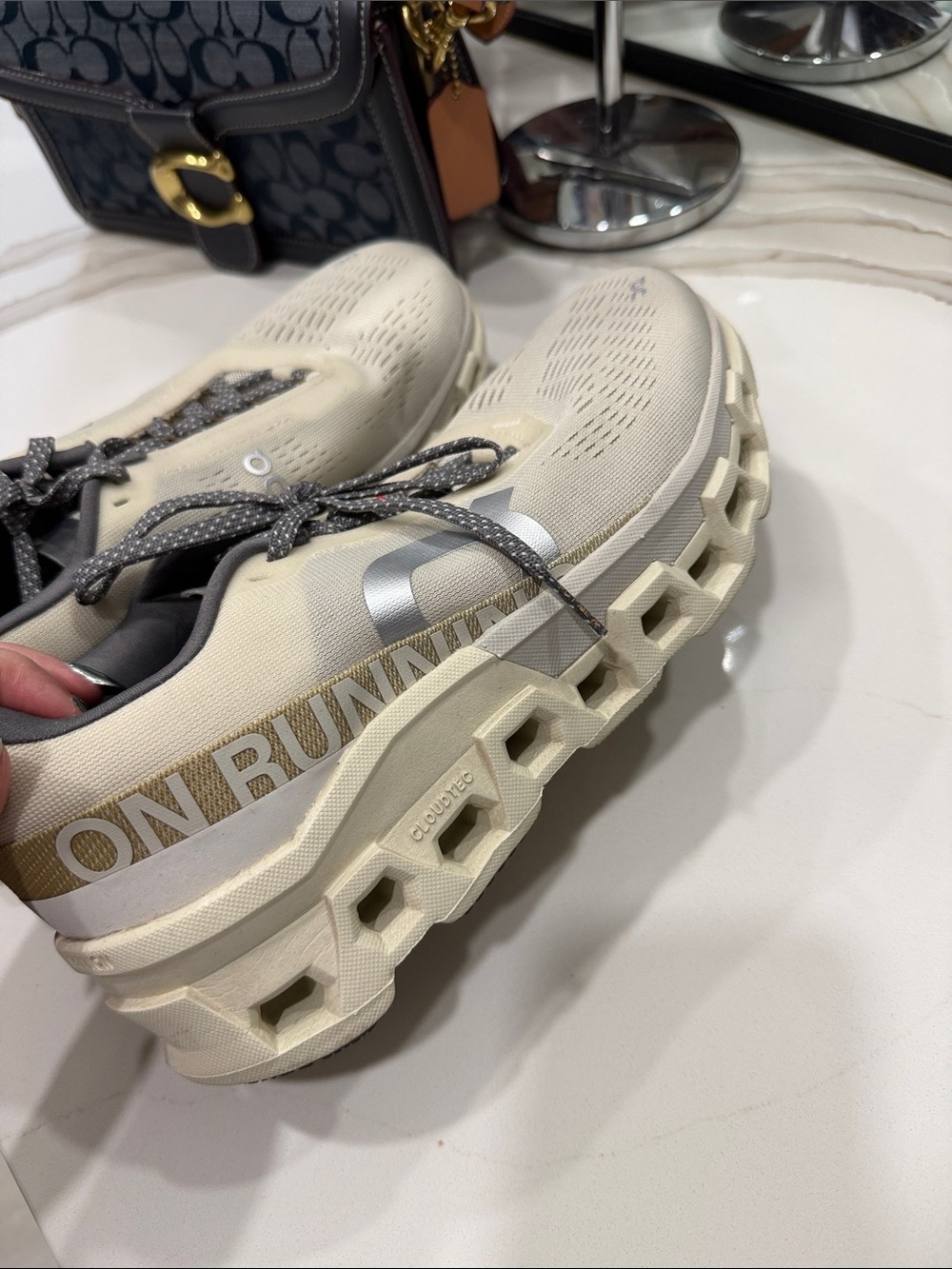 On Running Women’s CloudMonster Ivory Sneakers